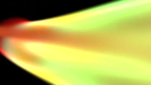 Yellow particles orbiting a warm point of light.