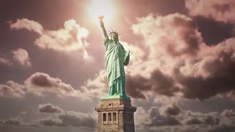The Statue of Liberty standing over the harbour.