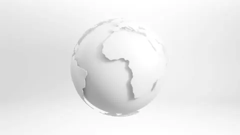 A wireframe globe turning on a dark backdrop.