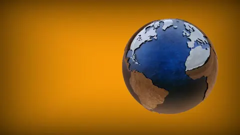 The planet turning slowly, clouds moving across it.