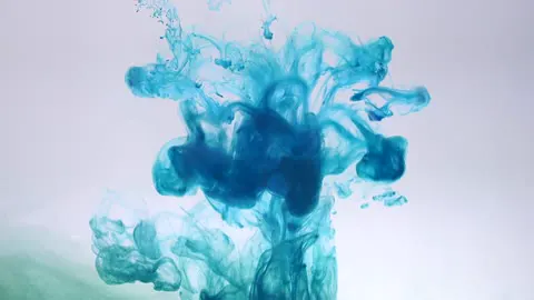 An abstract loop of colour bleeding into colour.