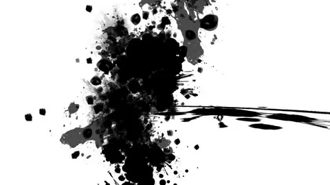 Paint spreading and swirling through water.
