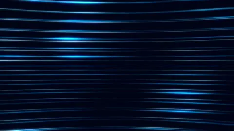 Light coming through a window and moving across the wall.