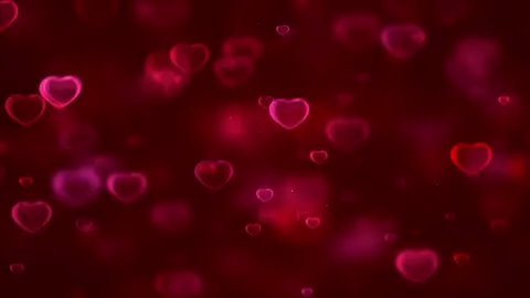 Red hearts rising through a warm animated scene.