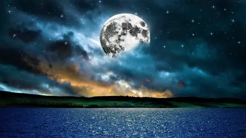 A starry night mirrored on a calm ocean.