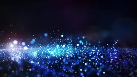 Blue particles drifting in a dark, glittering haze.